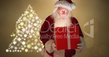Santa holding gift box and Golden Snowflake Christmas tree pattern shape