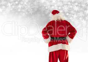 Santa looking at Snowflake Christmas pattern and blank space