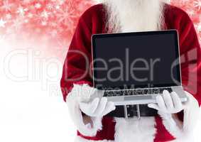 Santa holding laptop and Snowflake Christmas pattern and blank space