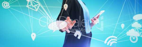 Composite image of mid section of businesswoman using mobile phone while using imaginary interface