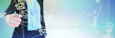 Composite image of mid section of businesswoman touching imaginary interface