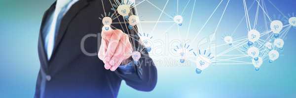 Composite image of mid section of businessman gesturing on invisible interface