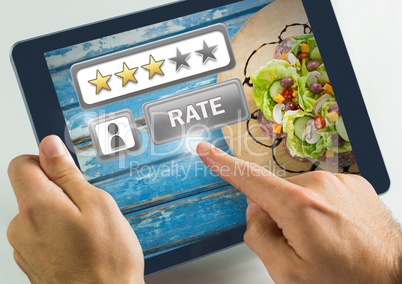 Hand touching tablet with Rate button and review stars with food