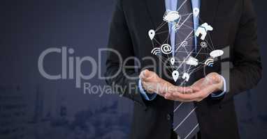 Mixed various app icons connected and Businessman with hands palm open and dark background