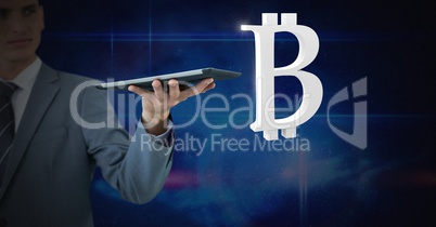 Hands holding tablet with bitcoin symbol icon