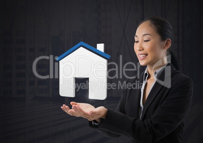 Home icon symbol and Businesswoman with hands palm open and dark background