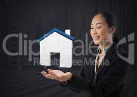 Home icon symbol and Businesswoman with hands palm open and dark background