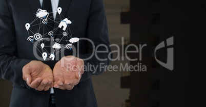 Mixed various app icons connected and Businessman with hands palm open and dark background