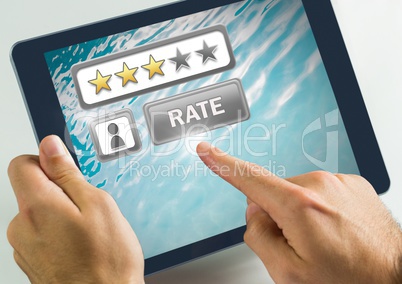 Hand touching tablet with Rate button and review stars in swimming pool