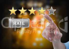 Hand touching review stars and rate button