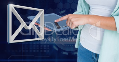 Hand holding tablet with 3D email message icon