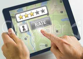 Hand touching tablet with Rate button and review stars with map locations