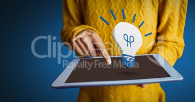 Hand holding tablet with 3D light bulb idea icon