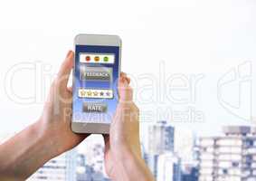 Hand holding phone with star review ratings in city