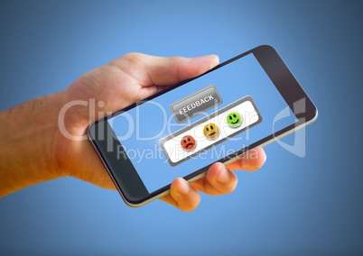Hand holding phone with feedback review satisfaction smiley face icons