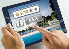 Hand touching tablet with Rate button and review stars in swimming pool