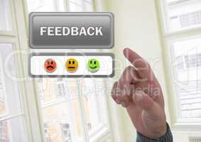 Hand pointing at feedback button and feedback smiley faces satisfaction icons