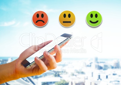 Hand holding phone and Feedback smiley satisfaction icons
