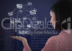 Email message app icons connected and Businesswoman with hands palm open and dark background