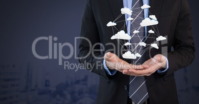 cloud app icons connected and Businessman with hands palm open and dark background