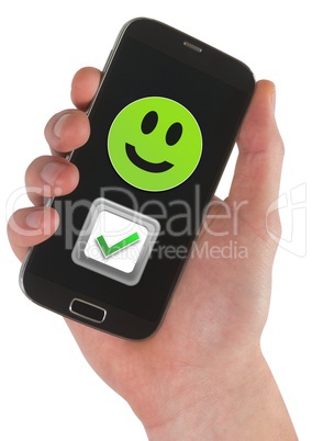 Hand holding phone with smiley face and correct tick feedback