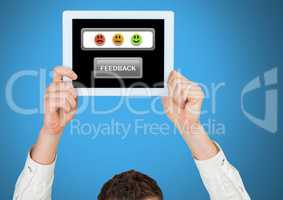 Man holding tablet with feedback smiley satisfaction icons