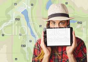 Girl holding tablet on map locations background