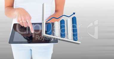 Hand holding tablet with 3D bar chart statistics icon