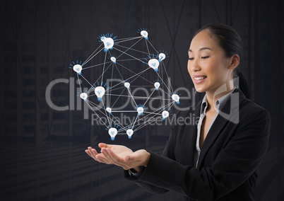 idea light bulb app icons connected and Businesswoman with hands palm open and dark background