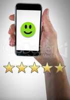 Hand holding phone with smiley face and five star review