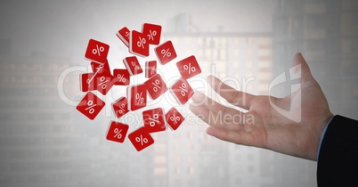 Percent icons and Businessman with hand palm open and dark background