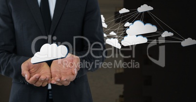 Cloud icons and Businessman with hands palm open and dark background