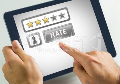 Hands holding tablet with review star ratings