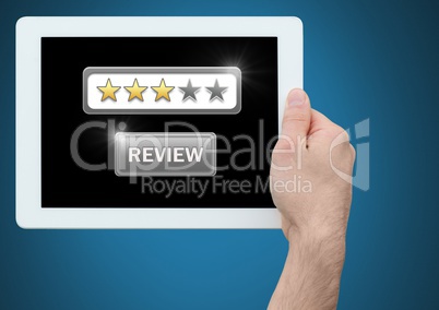 Hands holding tablet with review star ratings