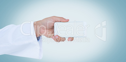 Male doctor holding smart phone with blank screen