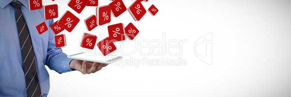 Composite image of mid section of businessman holding tablet pc