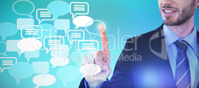 Composite image of mid section of smiling businessman touching invisible screen