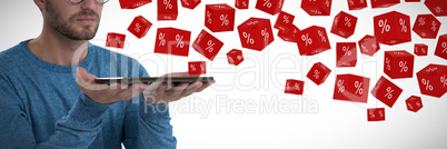 Composite image of man holding digital tablet