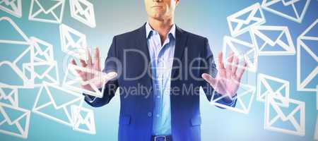 Composite image of businessman touching the invisible screen