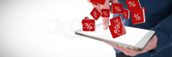Composite image of close up mid sectiong of businessman using tablet pc