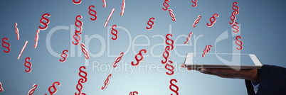 Composite image of businessman holding digital tablet Composite image of businessman holding digital tablet