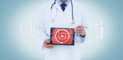 Composite image of a doctor showing digital tablet