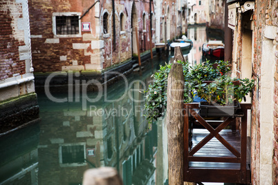 Venetian balcony on the canal .