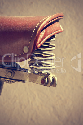 Retro bicycle saddle detail. Vintage style.