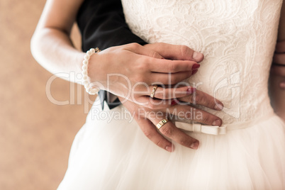 the bride and groom held hands