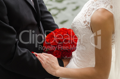 the bride and groom held hands