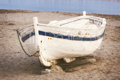 Old boat on the sand