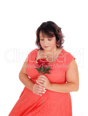 Portrait of big woman with rose
