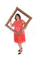 Big woman holding a picture frame