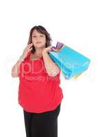 Overweight woman holding her shopping bag's